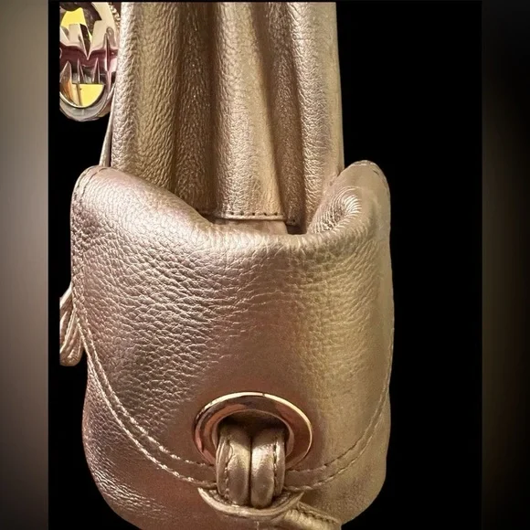 Michael Kors Metallic Gold Leather Drawstring Shoulder Bag. - Picture 5 of 16